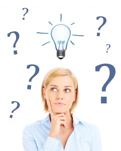 Woman is having question to idea over white background